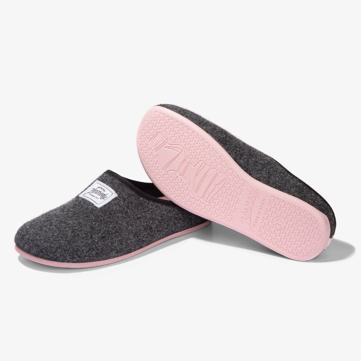 Women's Mercredy Wool Slippers with a Rubber Sole, made from Recycled Plastic Bottles, Black upper & Pink sole.