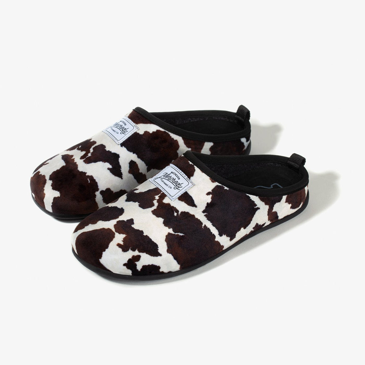 Women's Mercredy Wool Slippers with a Rubber Sole, made from Recycled Plastic Bottles, Cow Print Fabric Upper